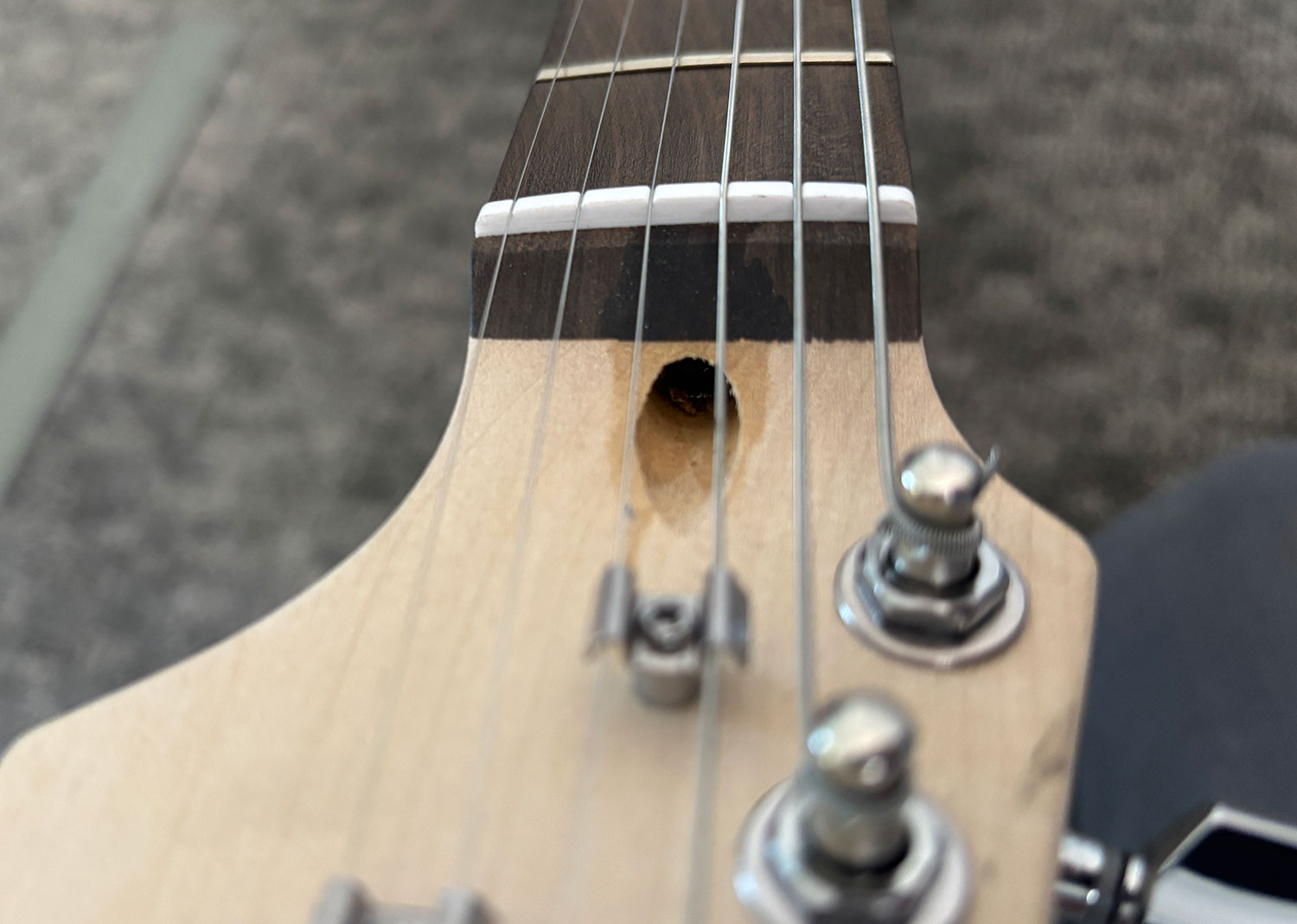 Truss rod nut location